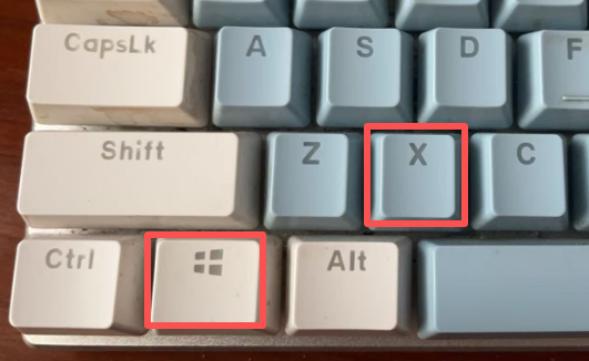 按住Win+X组合键图示